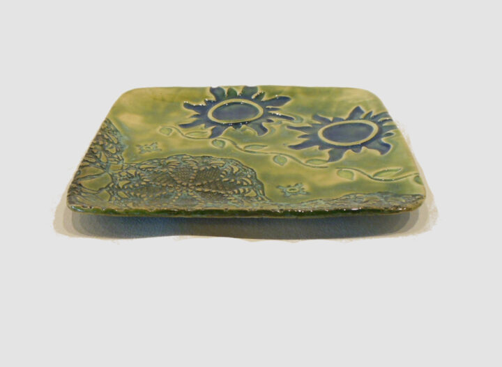 Square Tray Green with 2 blue suns by Nellie Ralat side