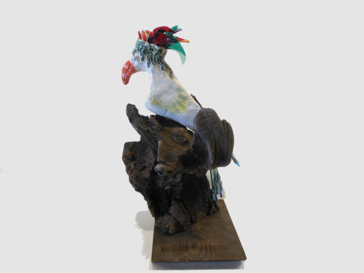 Parrot on Wood 1 by Marilyn Austin left